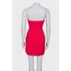 Red dress with frills, with a tag