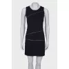 Dress with a decorated zipper