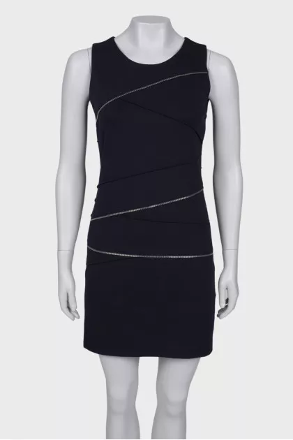 Dress with a decorated zipper