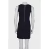 Dress with a decorated zipper