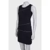 Dress with a decorated zipper