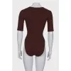 Brown short sleeve bodysuit with tag