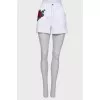 White shorts with embroidery