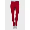 Red jeans with zipper pockets