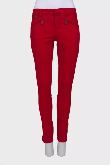Red jeans with zipper pockets
