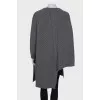 Knitted sweater with slits and asymmetry