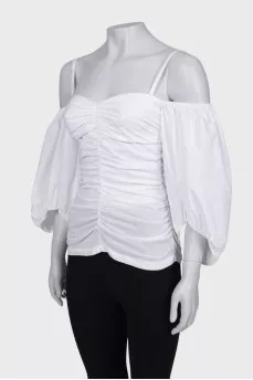 Draped blouse with puffed sleeves
