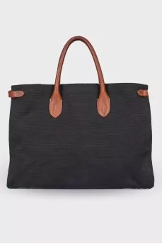 Textile bag with leather inserts
