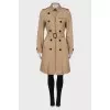 Beige trench coat with belt