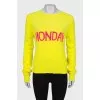 Wool yellow sweater with slogan