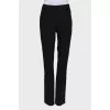 Black trousers with back pockets