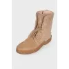 Suede boots with fur inserts