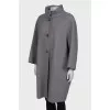 Wool coat with decorated press-studs