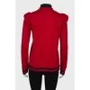 Red jacket with embroidery at the collar