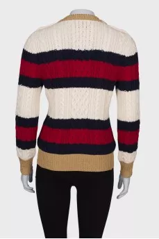 Sweater with beaded buttons on the shoulders