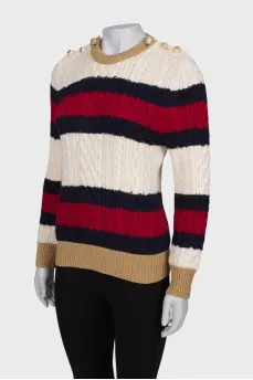 Sweater with beaded buttons on the shoulders
