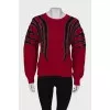 Red sweater with print