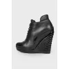 Leather ankle boots with patent inserts