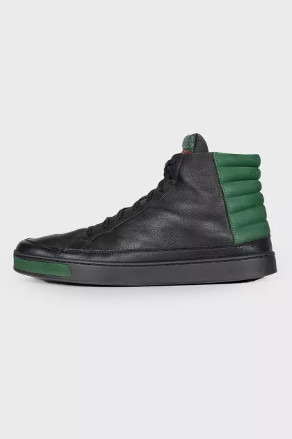 Men's black sneakers with green inserts
