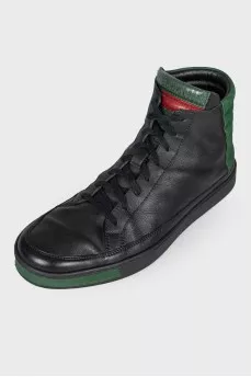 Men's black sneakers with green inserts