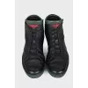 Men's black sneakers with green inserts