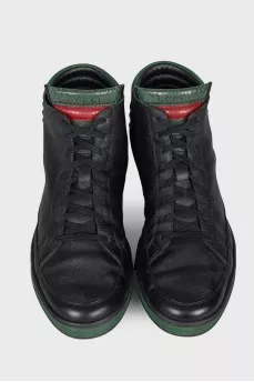 Men's black sneakers with green inserts