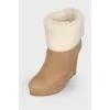 Beige suede wedge boots
