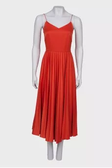 Orange dress with pleated skirt