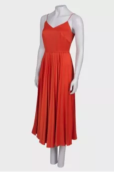 Orange dress with pleated skirt