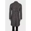 Coat in geometric black and white print