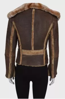 Brown sheepskin coat with a fur collar