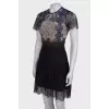 Lace dress with ruffles at the bottom