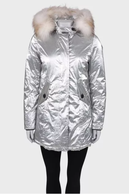 Silver parka with fur on the hood with a tag