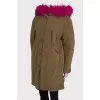 Green parka with pink fur with tag
