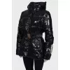 Lacquer jacket with a belt
