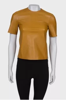Brown leather top with tag