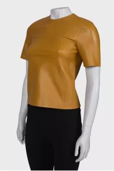 Brown leather top with tag