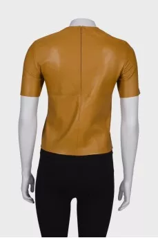 Brown leather top with tag
