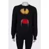 Black sweatshirt with fur inserts