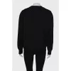 Black sweatshirt with fur inserts