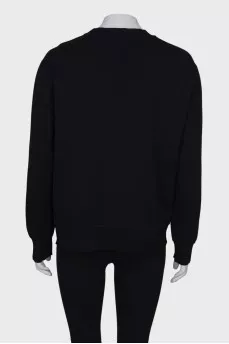 Black sweatshirt with fur inserts