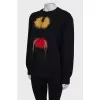 Black sweatshirt with fur inserts