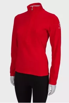 Red sweater with a zipper at the collar