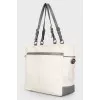 White leather bag with gray inserts