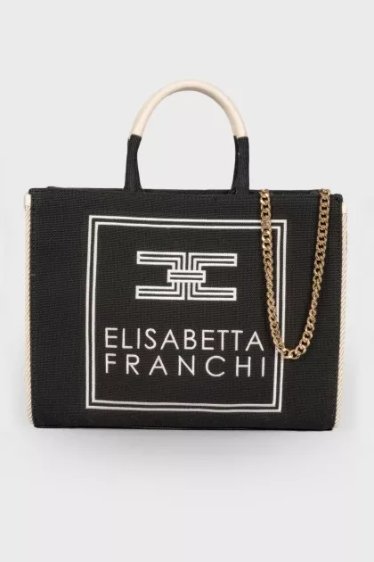 Textile bag with embroidered brand logo