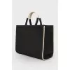 Textile bag with embroidered brand logo