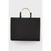 Textile bag with embroidered brand logo