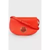 Red leather semi-circular bag
