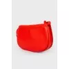 Red leather semi-circular bag