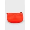 Red leather semi-circular bag